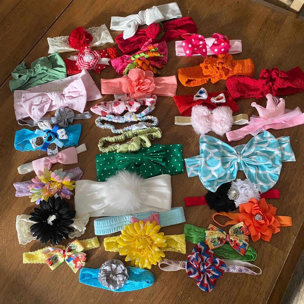 Lot of baby headbands. 33 pieces total.